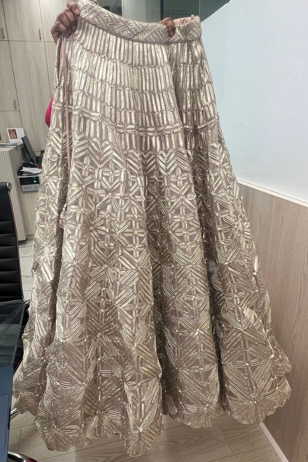 Varun & Nidhika Champagne Gold Embellished Lehenga Set