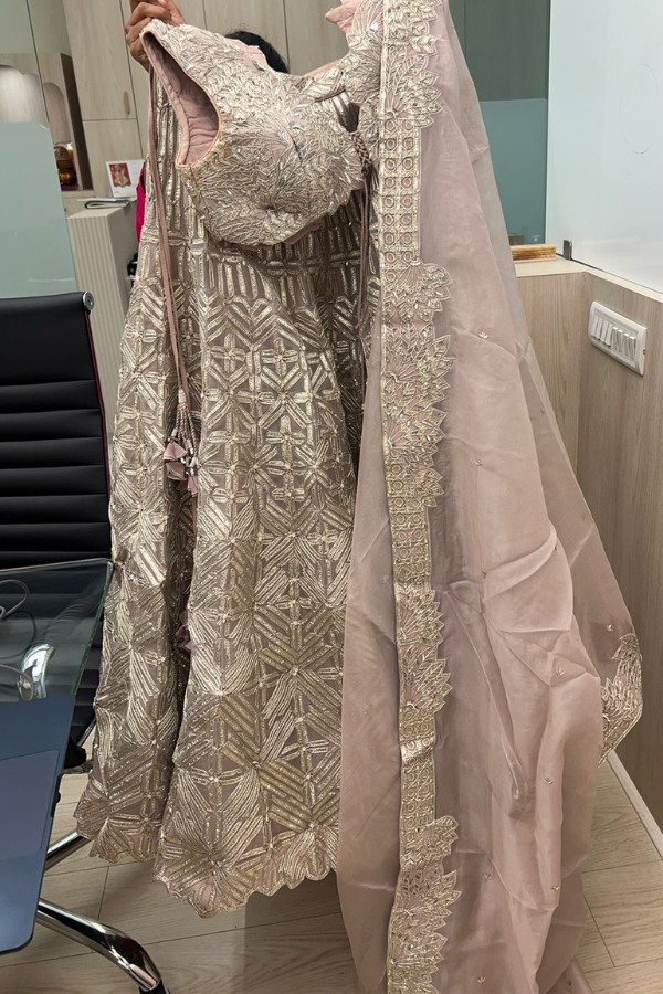 Varun & Nidhika Champagne Gold Embellished Lehenga Set