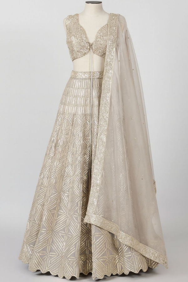 Varun & Nidhika Champagne Gold Embellished Lehenga Set