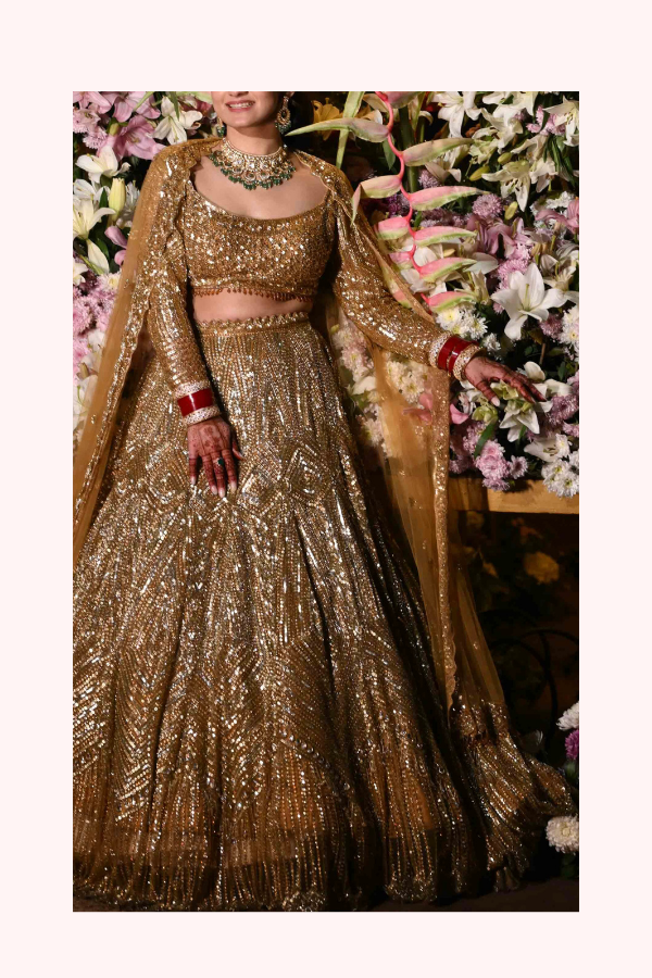 Isa by Dolly Wahal Gold Embellished Lehenga Set