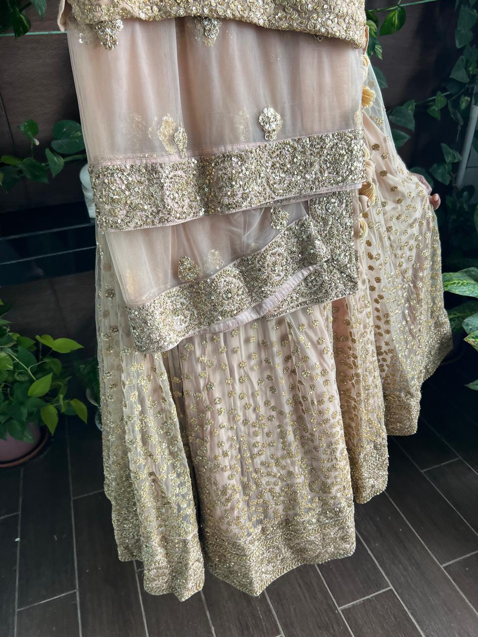 Sabyasachi Peach Net Lehenga Set