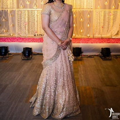 Sabyasachi Peach Net Lehenga Set