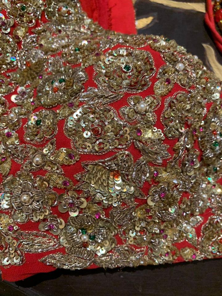 Rimple & Harpreet Red & Gold Embroidered Lehenga Set