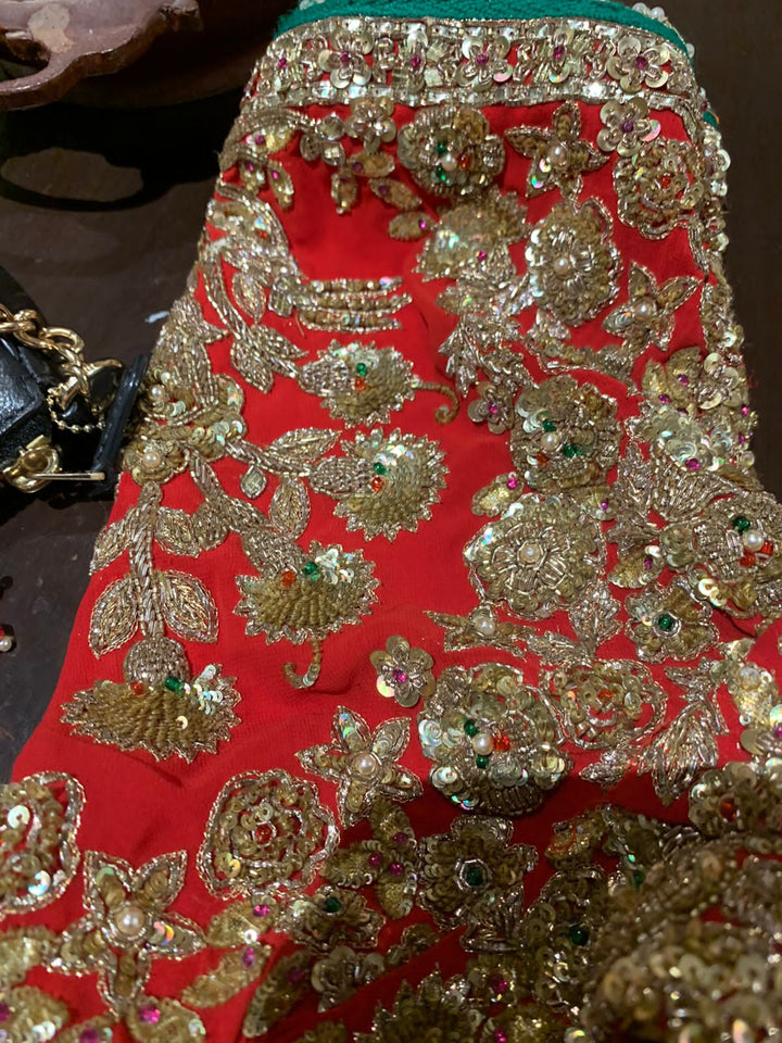 Rimple & Harpreet Red & Gold Embroidered Lehenga Set
