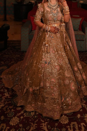 Rimple & harpreet Gold and pink embroidered lehenga