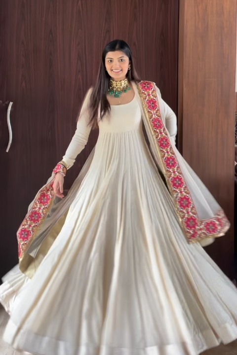 White anarkali deals with golden border