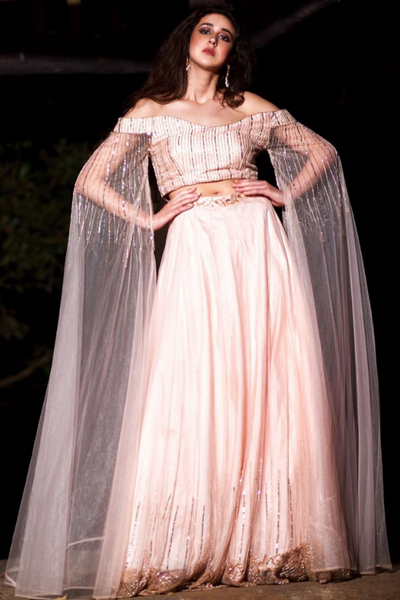 rose pink lehenga with cape sleeves