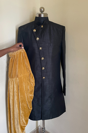 black achkan with gold buttons